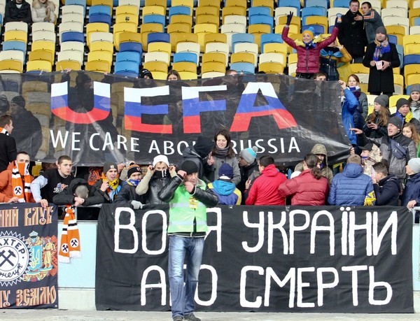 Болельщики в Киеве на НСК Олимпийский вывесили баннер  UEFA - we care about Russia 