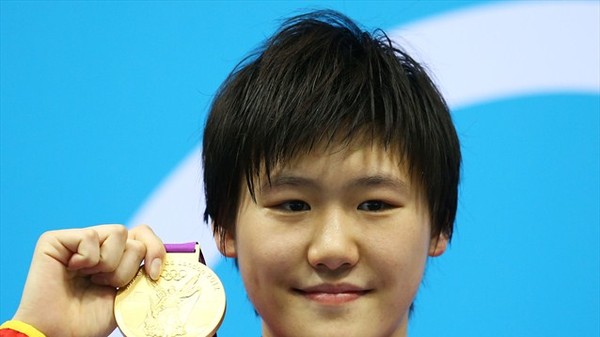 Е Шивэнь с золотой медалью